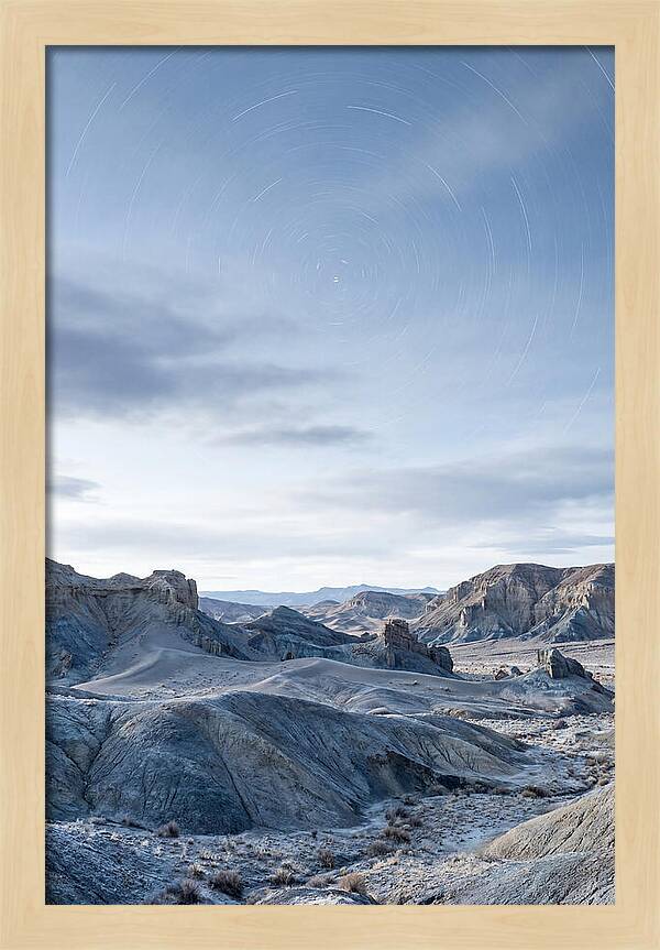 Star Trails Over Serene Landscape