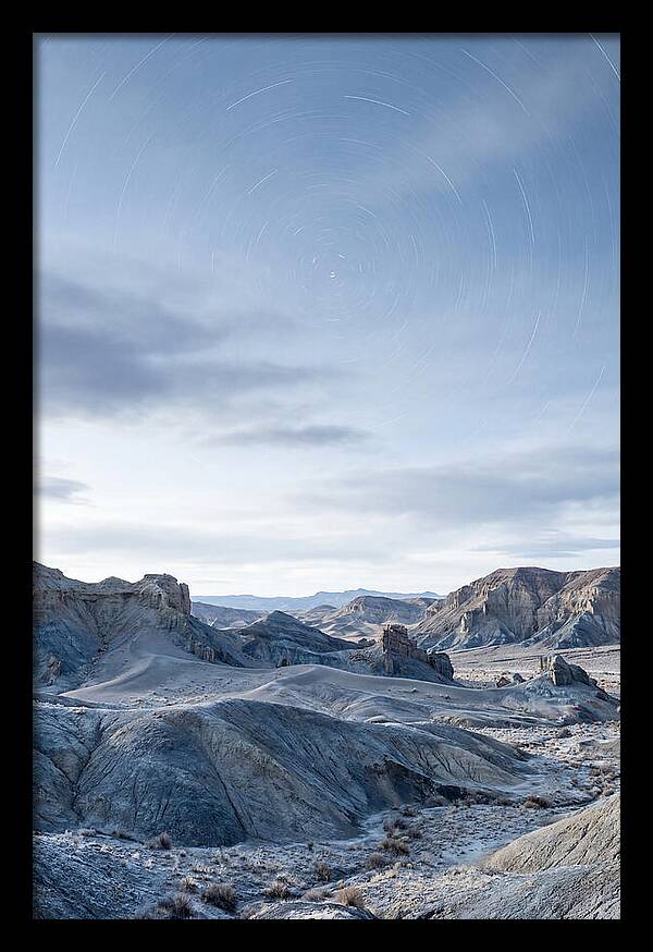 Star Trails Over Serene Landscape