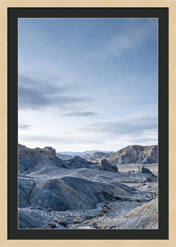 Star Trails Over Serene Landscape