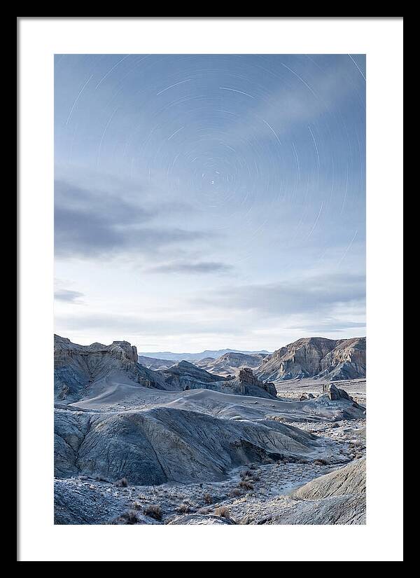 Star Trails Over Serene Landscape