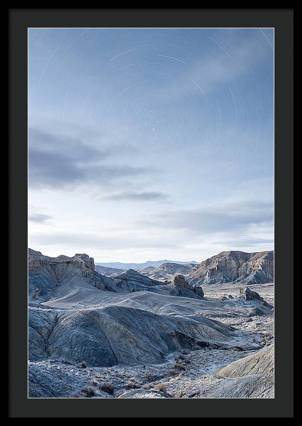 Star Trails Over Serene Landscape