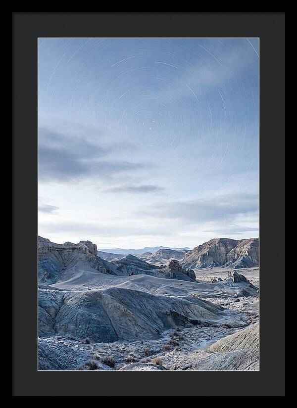 Star Trails Over Serene Landscape