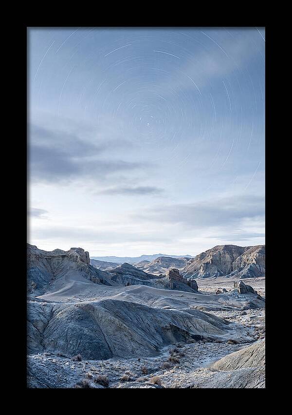 Star Trails Over Serene Landscape