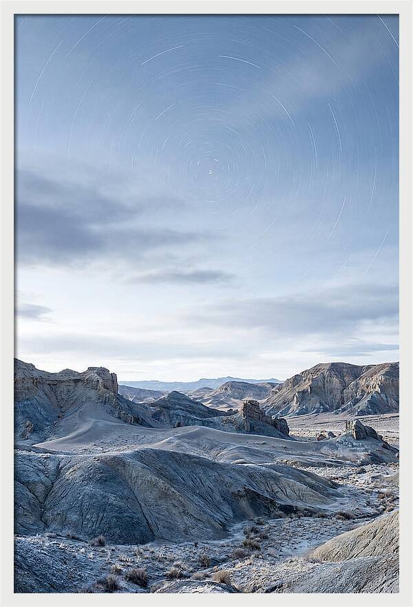 Star Trails Over Serene Landscape