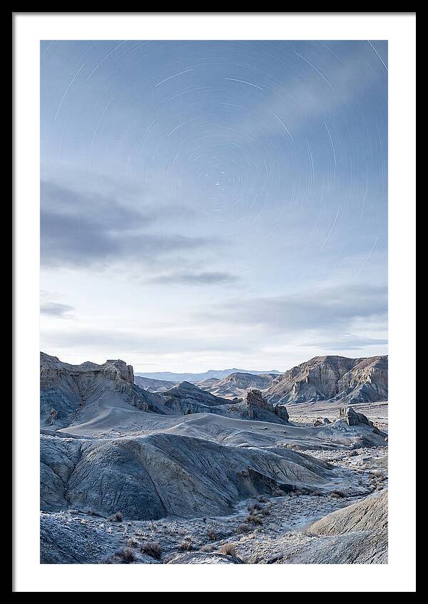 Star Trails Over Serene Landscape