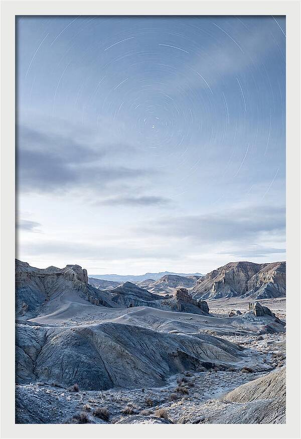 Star Trails Over Serene Landscape