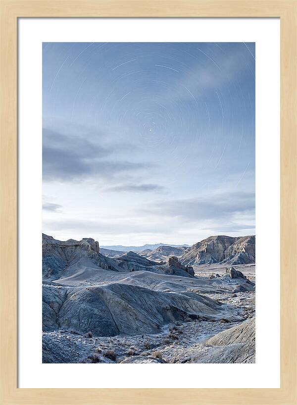 Star Trails Over Serene Landscape