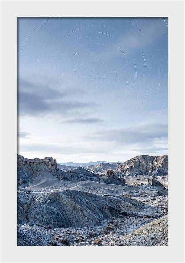 Star Trails Over Serene Landscape