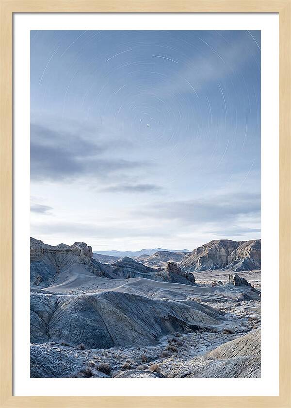 Star Trails Over Serene Landscape