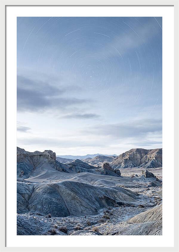 Star Trails Over Serene Landscape