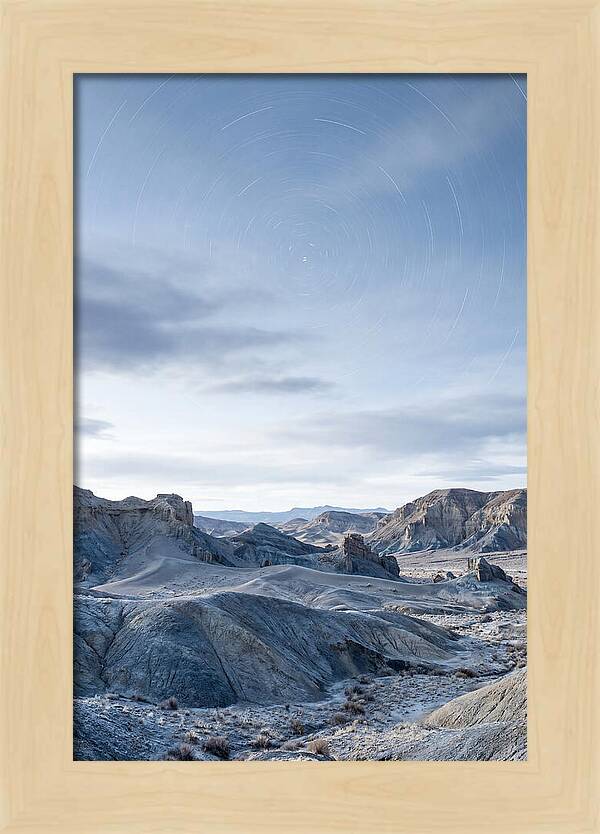 Star Trails Over Serene Landscape