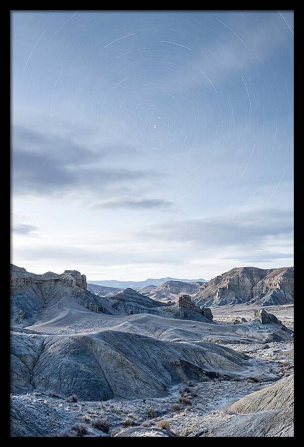 Star Trails Over Serene Landscape