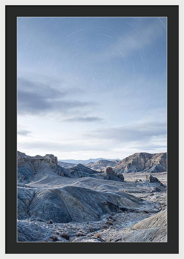 Star Trails Over Serene Landscape