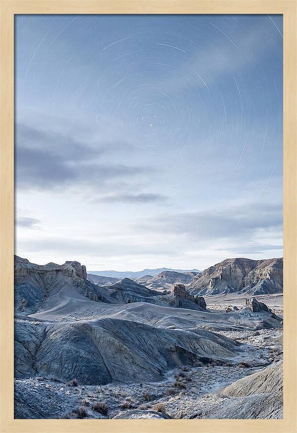 Star Trails Over Serene Landscape