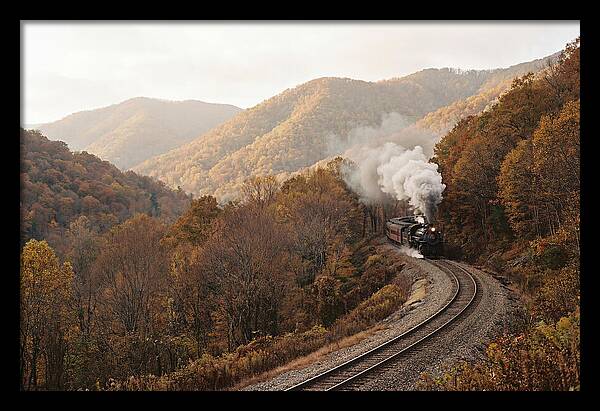 Steam Train Through Autumn Landscape