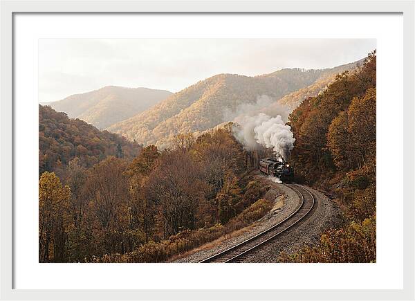 Steam Train Through Autumn Landscape