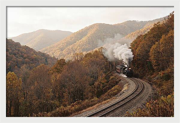 Steam Train Through Autumn Landscape