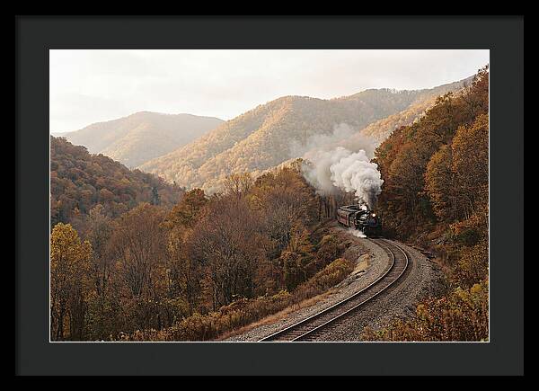 Steam Train Through Autumn Landscape