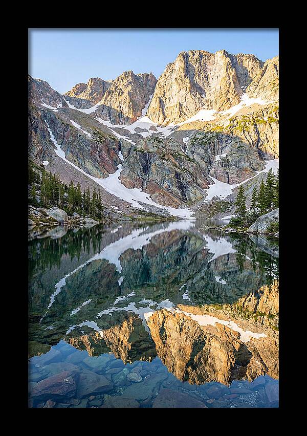 Steep Cliffs Above Mountain Lake