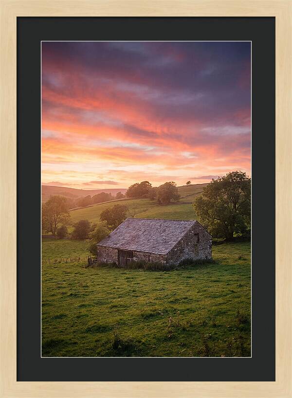 Stone Barn Under Vibrant Skies
