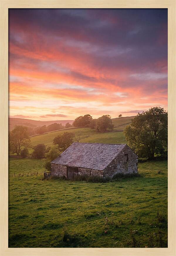 Stone Barn Under Vibrant Skies