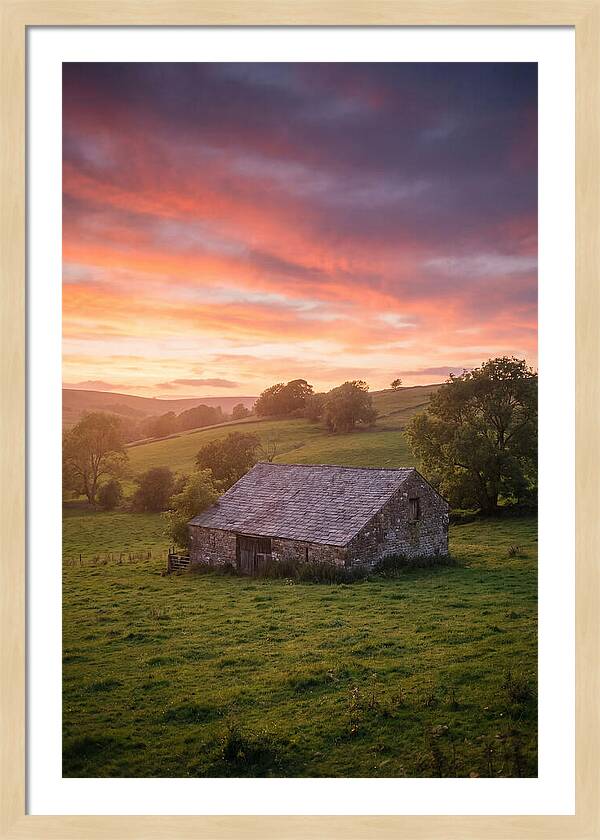 Stone Barn Under Vibrant Skies