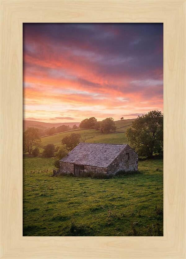 Stone Barn Under Vibrant Skies