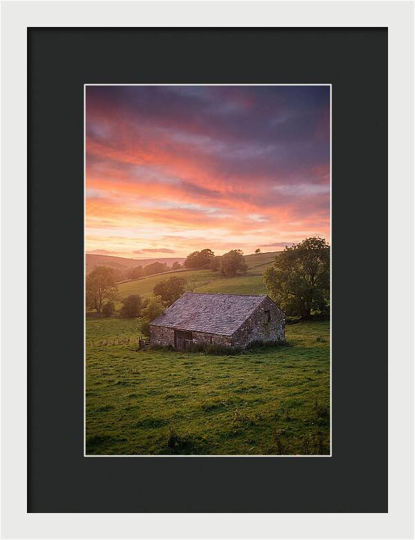 Stone Barn Under Vibrant Skies