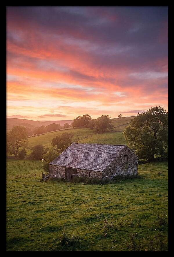 Stone Barn Under Vibrant Skies