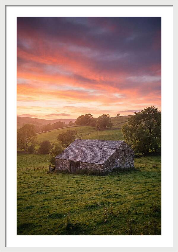 Stone Barn Under Vibrant Skies