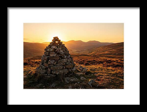 Stone Cairn At Sunset