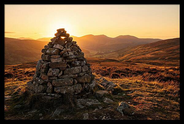 Stone Cairn At Sunset