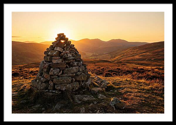 Stone Cairn At Sunset