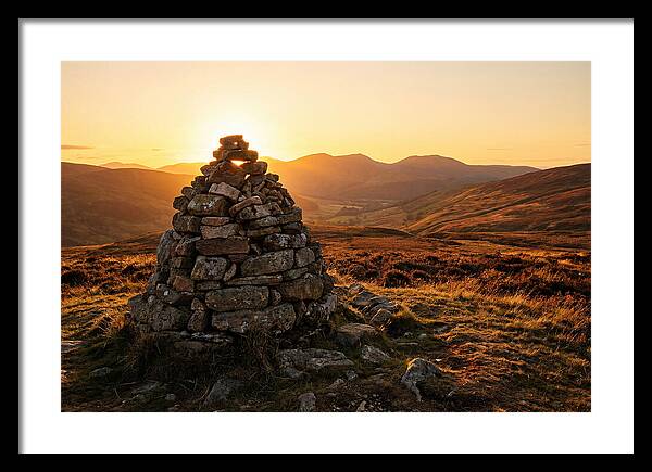 Stone Cairn At Sunset