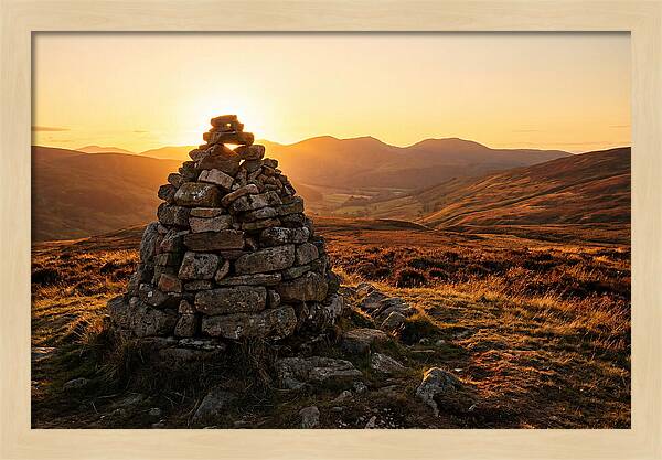 Stone Cairn At Sunset