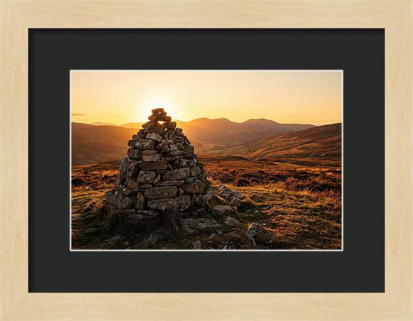 Stone Cairn At Sunset