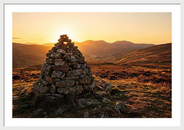 Stone Cairn At Sunset
