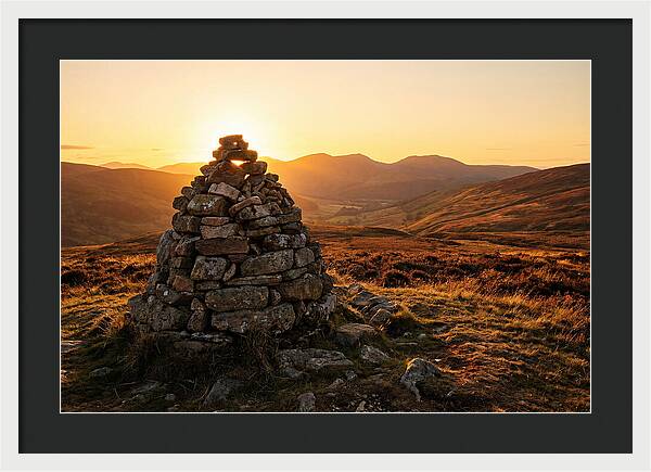 Stone Cairn At Sunset