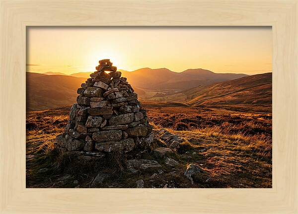 Stone Cairn At Sunset