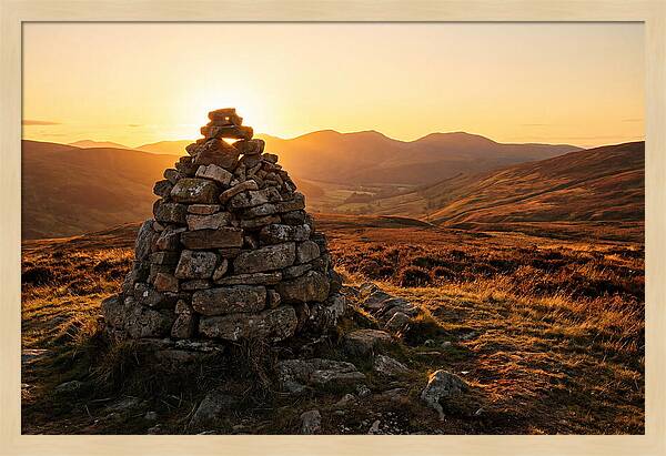 Stone Cairn At Sunset