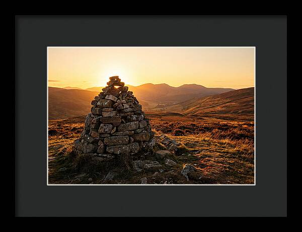 Stone Cairn At Sunset