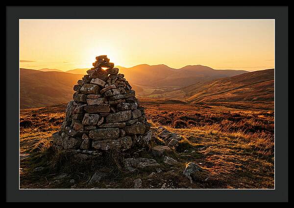 Stone Cairn At Sunset
