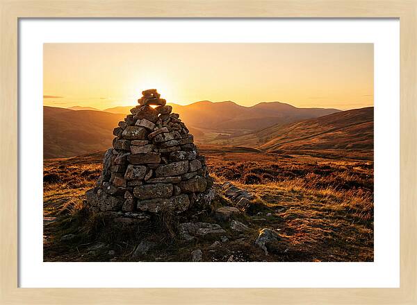 Stone Cairn At Sunset