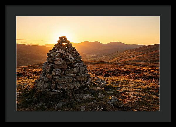 Stone Cairn At Sunset