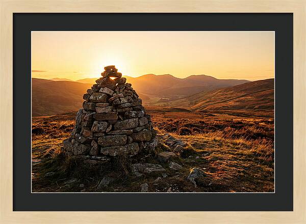 Stone Cairn At Sunset