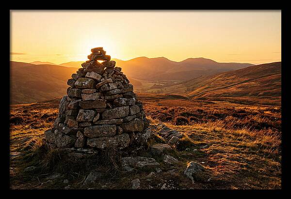 Stone Cairn At Sunset