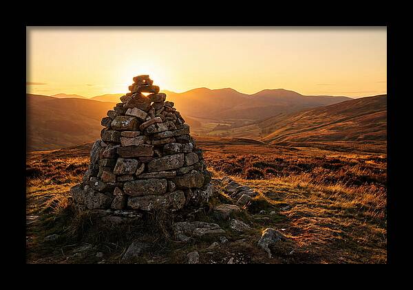 Stone Cairn At Sunset