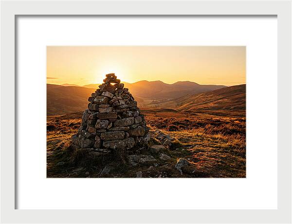 Stone Cairn At Sunset