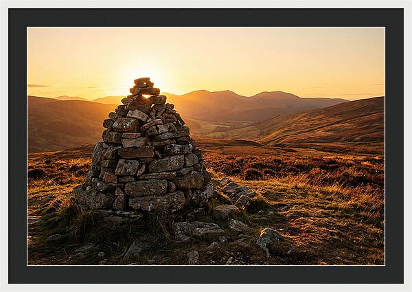 Stone Cairn At Sunset