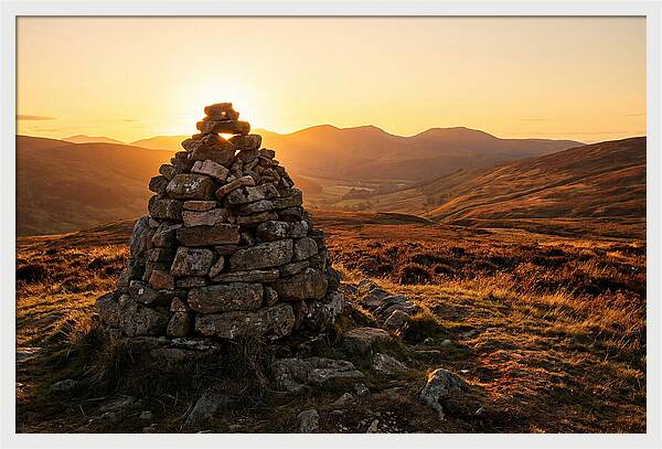 Stone Cairn At Sunset